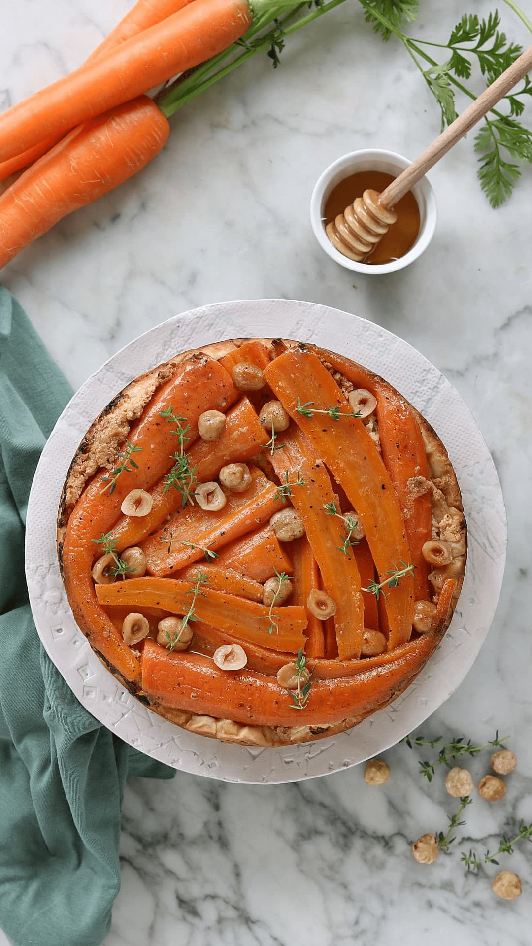 Savory pie with cheese and glazed carrots (carrot tatin) with honey